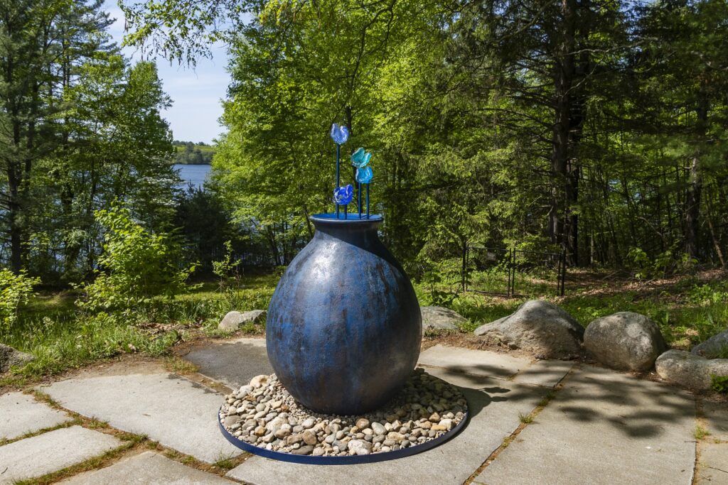EVELYN RYDZ, Holding Water, 2025, Cast Glass, Steel, Concrete and Field Stones